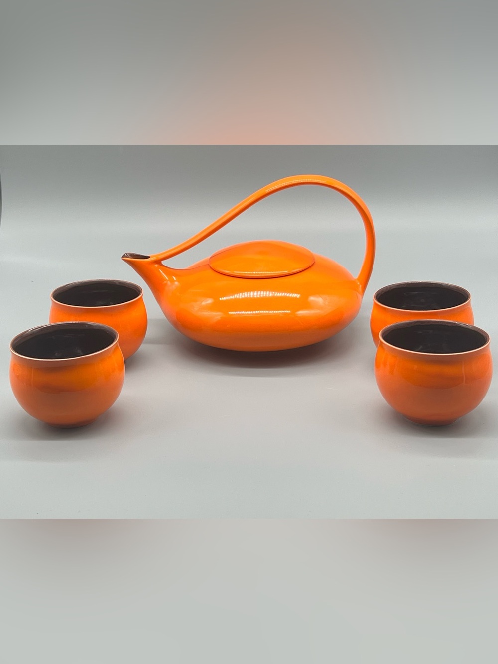 Teavana Bright Orange Ceramic Teapot with Four Matching Cups